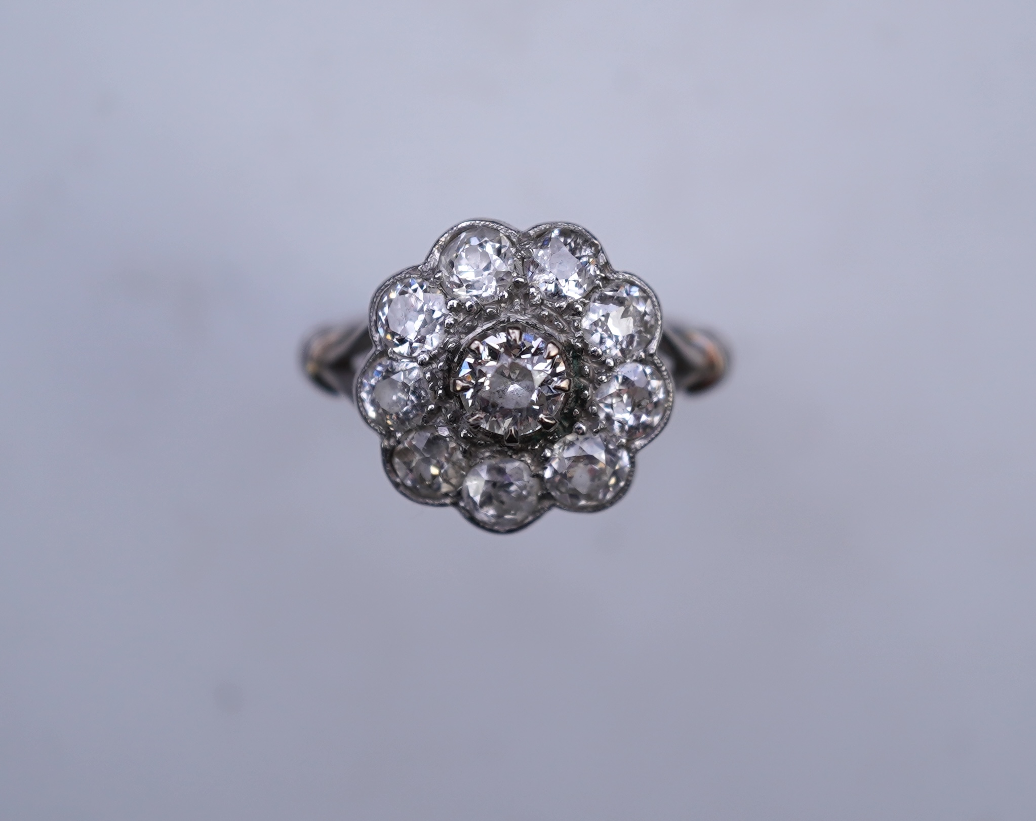 A diamond cluster ring, early 20th century
